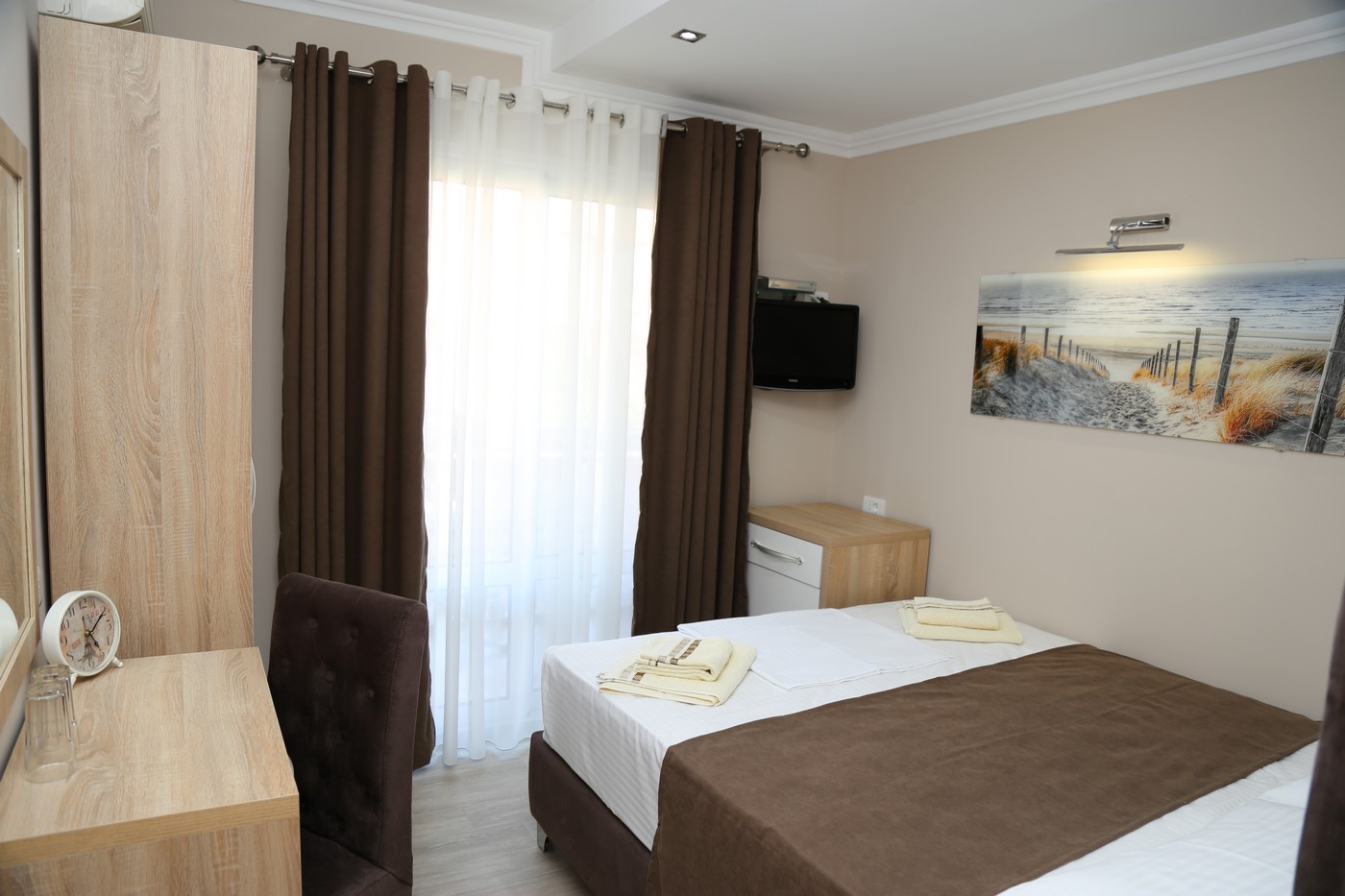 Apartmani Holiday